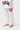 Red circular Gracie Barra Carlos Gracie Jr. patch on the pant leg of the white 40 Year Anniversary Kimono, with the GB jacket tab and blue belt tail.