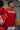 Mens Gracie Barra 40 Years Competition Team T-shirt in red worn in a jiu-jitsu academy setting, featuring the Gracie Barra Competition Team chest logo