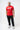 Student wearing the red 40 Years Competition Team mens tee with the white Gracie Barra wordmark and black Competition Team bar, front view