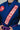 Close-up of a blue Pro Lite Comp Kimono by adidas featuring Gracie Barra branding on the chest lapel and patch, worn by a woman on a plain background.