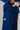 Close-up of right side of blue Pro Lite Comp Kimono by adidas showing white adidas logo and Gracie Barra patch