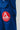 Close-up of blue Pro Lite Comp Kimono by adidas showing Gracie Barra patch and Jiu-Jitsu embroidery on the pants