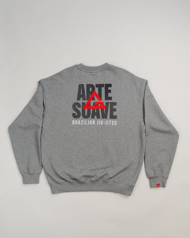 Back view of grey Arte Suave V2 men’s crewneck sweatshirt in French terry by Gracie Barra, featuring large “Arte Suave” graphic with integrated flow pattern, red Legacy G logo, and “Brazilian Jiu-Jitsu” text in white.