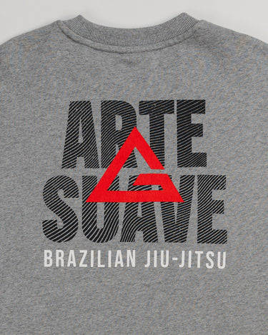 Close-up of back graphic on grey Arte Suave V2 men’s crewneck sweatshirt in French terry by Gracie Barra, featuring large “Arte Suave” text with integrated flow pattern, red Legacy G logo, and “Brazilian Jiu-Jitsu” text in white.