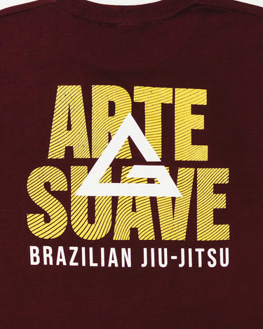 Close-up of Arte Suave V2 men’s maroon T-shirt back with large yellow “Arte Suave” text, bold white Legacy G logo, and “Brazilian Jiu-Jitsu” in white, displayed on a white background.