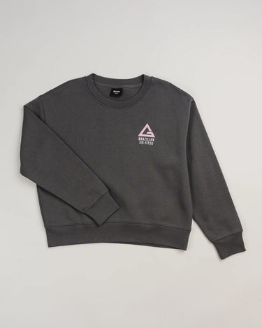 Dark grey Arte Suave V2 women’s crewneck sweatshirt by Gracie Barra, featuring pink Legacy G chest logo with “Brazilian Jiu-Jitsu” text in white and ribbed cuffs and hem.