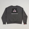 Back view of dark grey Arte Suave V2 women’s crewneck sweatshirt by Gracie Barra, featuring large “Arte Suave” graphic with integrated flow pattern, pink Legacy G logo, and “Brazilian Jiu-Jitsu” text in white.