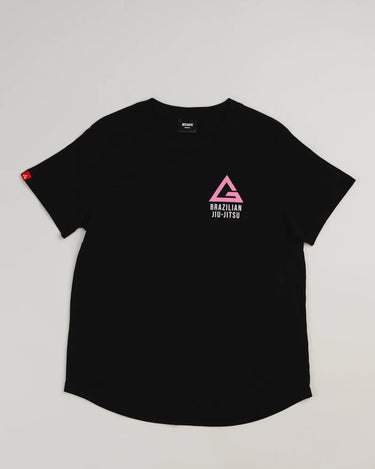 Arte Suave V2 women’s T-shirt in black by Gracie Barra, featuring a pink Legacy G logo above “Brazilian Jiu-Jitsu” text on the left chest and a red sleeve tag, displayed on a light gray background.