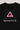 Close-up of the Arte Suave V2 women’s black T-shirt back, showcasing a pink Legacy G logo above “BRAZILIAN JIU-JITSU” text with faint “ARTE SUAVE” lettering in the background, displayed on a light gray backdrop.