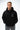 Arte Suave V3 Mens Hoodie in black, three-quarter front on model, hands in the kangaroo pocket. Silver Legacy G logo and white 'Arte Suave' chest script.
