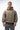 Arte Suave V3 Mens Hoodie in olive, front full-length on model with gray pants. Black Legacy G logo and cream 'Arte Suave' chest script, kangaroo pocket.