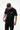 Arte Suave V3 men's tee in black, front on-model view with gray Legacy G logo and white Arte Suave script at the left chest.