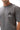 Arte Suave V3 Mens Tee in gray, front view on the model showing the chest print: black Legacy G logo above white 'Arte Suave' script.
