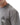 Arte Suave V3 Mens Tee in gray, three-quarter view showing the boxy drop-shoulder fit and the small Legacy G and 'Arte Suave' chest print.