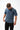 Arte Suave V3 Mens Tee in navy, front view on the model showing the boxy fit and the small Legacy G and 'Arte Suave' chest print.