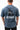 Arte Suave V3 Mens Tee in navy, back view on the model. Full-back print: white 'Arte Suave' script, black tonal figure, white 'Gracie Barra' wordmark.