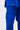 Light blue Competition embroidery on the ripstop pant leg of the blue AtletaGB V5 CompLite Kimono, below the GB woven tab on the jacket hem.