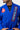 Chest detail of the blue AtletaGB V5 CompLite Kimono with the Barra Shield and the navy and red Gracie Barra lapel patch.