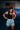 Black Gracie Barra Balance Sports Bra worn on the mats, front view with the rubberized white Legacy G logo centered on the chest.