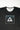 Close-up of the white Legacy G and Barra Da Tijuca box graphic over a boardwalk tile print on the black Gracie Barra Terra Mar tee