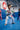 Young student in the white Brasileiro Youth Kimono by adidas, showing the green three-stripe sleeves and red Barra Shield patch, in a Gracie Barra class.
