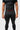 Front waistband detail of the black Gracie Barra Close Contact Compression Pants with the red Gracie Barra wordmark on the structured elastic waistband.