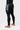 Back view of the black Gracie Barra Close Contact Compression Pants with the stacked Gracie Barra side panel, red Legacy G waistband tab and calf Barra Shield.