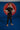 Kids black Gracie Barra Close Contact rashguard worn on the mat, front view, with red Gracie Barra Jiu-Jitsu chest logo and red Legacy G neck logo