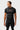 Black Gracie Barra Close Contact Rashguard, front view, with the red Legacy G, Gracie Barra Jiu-Jitsu chest print and gray shoulder panels.