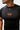 Close-up of the red Legacy G and the Gracie Barra Jiu-Jitsu chest print on the black Close Contact Rashguard.