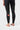 Back view of the black Close Contact Womens Compression Pants showing the red Barra Shield on the calf and the shaped knee panel seams.