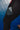 Close-up of the gray striped hip panel on the black Close Contact womens compression pants, worn on a blue mat.