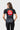 Back of the black Close Contact Womens Rashguard with the red Barra Shield, white Equipe wordmark and gray striped lower back panel.
