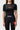 Front view of the black Close Contact Womens Rashguard showing the hip-length hem, orange Gracie Barra wordmark and white Jiu-Jitsu print.