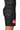 Worn side-back view of the black Continuum No Gi Shorts by VG with the green Vanguard triangle graphic and red Barra Shield patch.