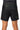 Back view of the black Continuum No Gi Shorts by VG worn on-model with tonal Vanguard seat graphic, Equipe GB waistband and green Vanguard triangle.