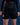 Black Continuum Womens No Gi Shorts by VG, front view, with Gracie Barra printed on the waistband and a red Barra Shield on the left leg.