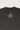 Close-up of the back neckline of the black Gracie Barra Emblem Tee featuring the Legacy G Jiu-Jitsu graphic.