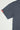Close-up of the slate Gracie Barra Emblem Tee sleeve featuring the red Gracie Barra woven tag.