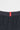 Back waistband of the Equipe Motion Men’s Shorts in grey, featuring a red woven Equipe label and reinforced stitching on lightweight performance fabric.