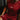 Man seated on a gym bench wearing maroon Gracie Barra Equipe Motion shorts with a reflective stacked Gracie Barra logo on the leg.