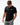 Flow Men's Tech Tee in black, full-length front view on a male model looking down, with the white Gracie Barra Stacked logo on the left chest