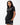 Flow Women's Tech Tee in black, full-length front view on a female model with the white Gracie Barra Stacked logo on the left chest