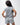 Flow Women's Tech Tee in light grey, back view on a female model showing the small dark Brazilian Jiu-Jitsu graphic high on the upper back