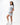 Frame Women's Short in light grey, side view on a female model with a hand in the side pocket, white Gracie Barra Stacked logo on the lower left leg