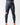 Model wearing black GB Essentials compression pants, front view showing Gracie Barra waistband and red logo on the left thigh