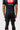 Back view of the black GB Essentials Mens Velcro Training Shorts showing the plain back panel, center seam and patterned side panels.