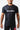 Man wearing the black GB Essentials Mesh Training Tee, front view showing the white EQUIPE chest print and red Legacy G