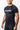 Angled front view of a man in the black GB Essentials Ranked Rashguard showing the Gracie Barra shoulder and sleeve print