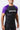 Angled front view of a model wearing the GB Essentials Ranked Rashguard in purple, highlighting the textured mesh side panel, red contrast stitching at the hem and EQUIPE Gracie Barra chest print